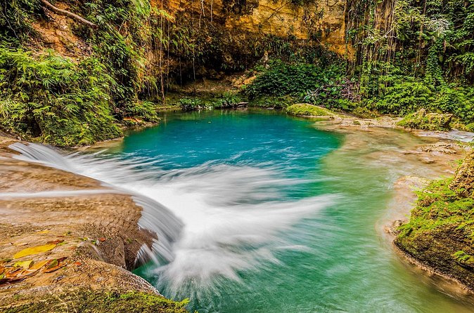 Action Pack Combo: Blue hole, river tubing and Dunn's River Falls - White River tubing changes the pace