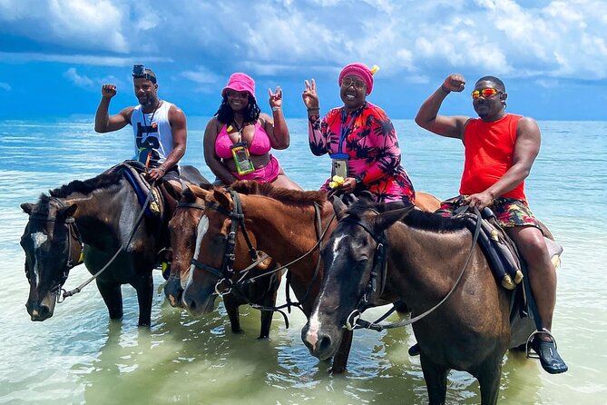 ATV, Bamboo Rafting , Horseback Ride & Blue Hole Falls Ocho Rios - ATV riding through mud, dirt, and jungle tracks