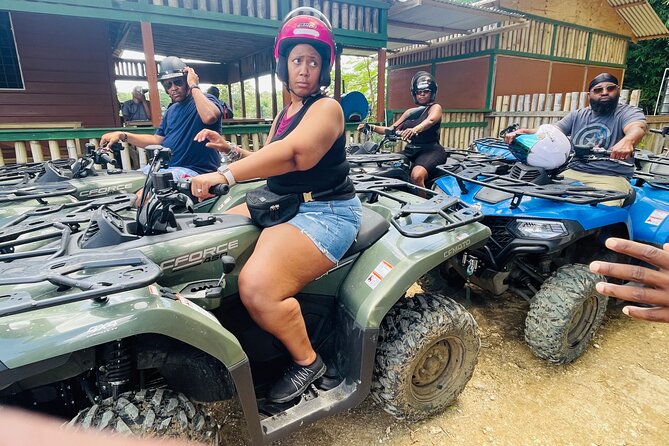 ATV Tour, Limestone Bamboo Rafting and Transportation - Sandy Bay: ATV Riding Through Puddles And Forest