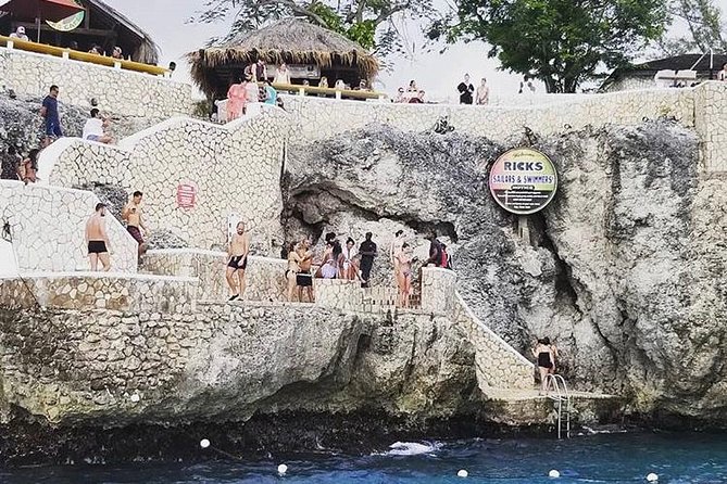 Bamboo Rafting and Limestone Foot Massage with Ricks Cafe Private Tour - Timing, Weather, and Cancellation Advice