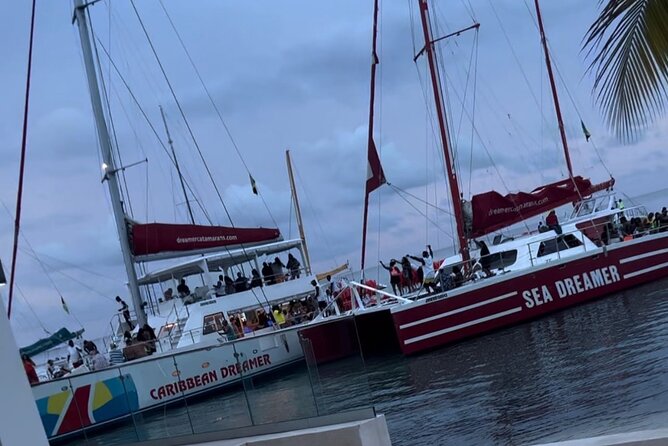 Bamboo Rafting, Catamaran Party Cruise and Snorkeling in Jamaica - Ending near sunset at Rick’s Café