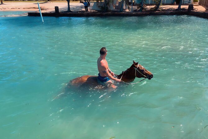 Bamboo Rafting & Horseback Ride n Swim Guided Tour in Montego Bay - A stop at Scotchie’s for real Jamaican flavor