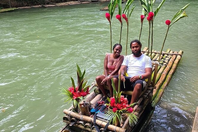 Bamboo Rafting Tour with Limestone Foot Massage in Montego Bay - Limestone foot massage on a moving raft