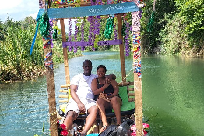 Bamboo River Rafting in Ocho Rios - Boarding the shaded bamboo raft