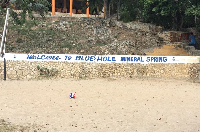 Blue Hole Mineral Springs, Rick's Café, and Shopping Combo Tour - Who should book this Negril tour?