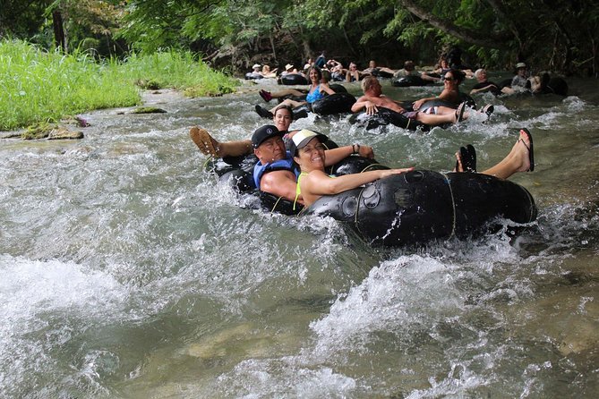 Blue Hole Secret Falls and River Tubing Private Tour - White River tubing slows the day down