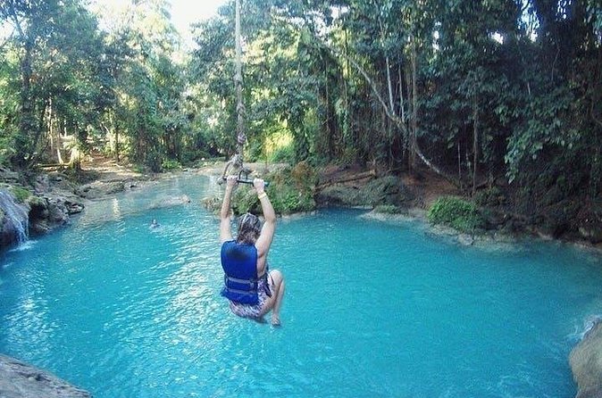 Blue Hole Secret Falls and River Tubing Tour - White River tubing through the rainforest