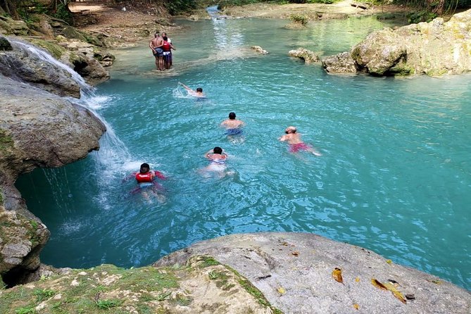Blue Hole & Secret Falls Day-Trip with Shopping from Grand Palladium - The human side depends on the guide