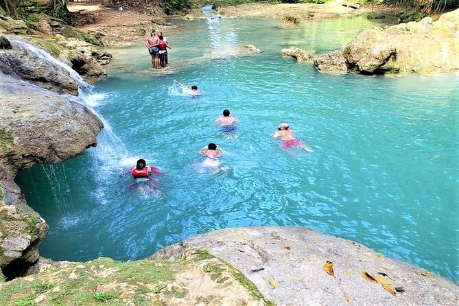Blue Hole & Secret Falls Day-Trip with Shopping from Grand Palladium - Secret Falls adds a short jungle walk