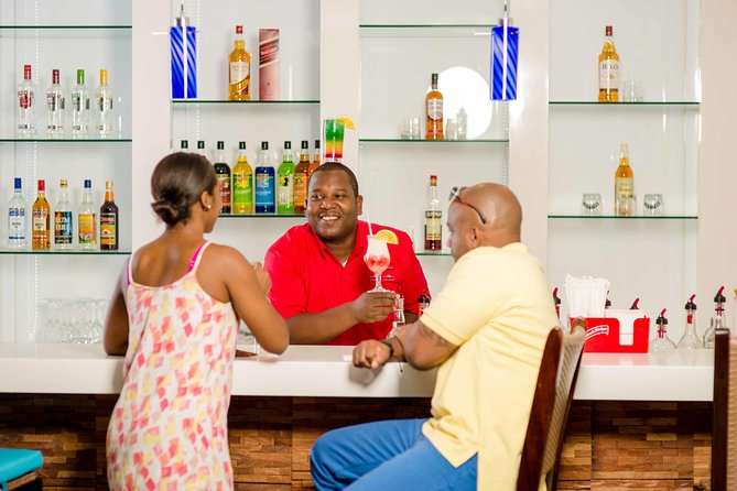 Departure Shuttle to Airport, Club Mobay Fast Track & VIP Lounge Combo - Checking in at Sangster International Airport