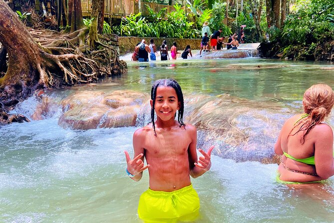 Dunn's River Falls and Horseback Riding Adventure Ocho Rios Ja - Climbing Dunn’s River Falls one wet step at a time