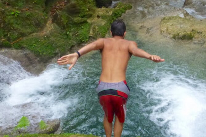 Dunn's River Falls, Blue Hole, Bamboo Rafting, Horseback Combo - Climbing Dunn’s River Falls for 90 minutes