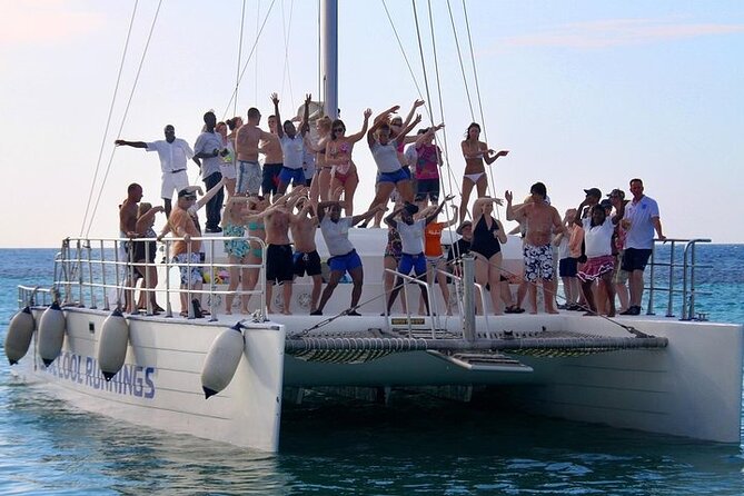 Dunn's River Falls Party Cruise, Blue Hole with Snorkeling, free beverages - Pack for a day when nothing stays dry