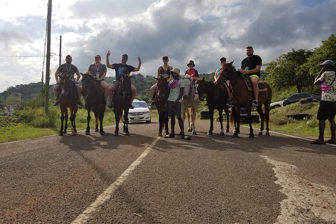 Dunn's River Falls, River Tubing, and Horseback Riding With Transportation - Floating through bamboo on White River