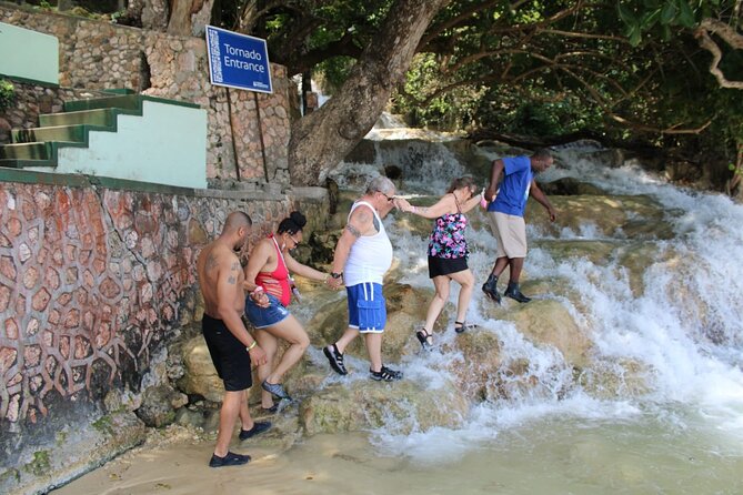 Dunns River Falls Half Day Private Tour Including Entry Fee. - Booking, weather, and cancellation details