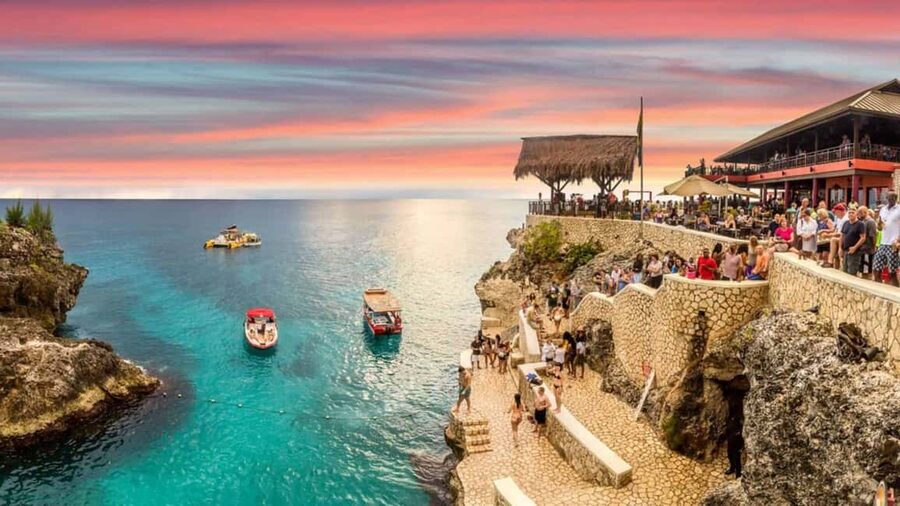 From Montego Bay/Falmouth: Negril Beach Catamaran Cruise - Seven Mile Beach: sand, swimming, and snorkeling