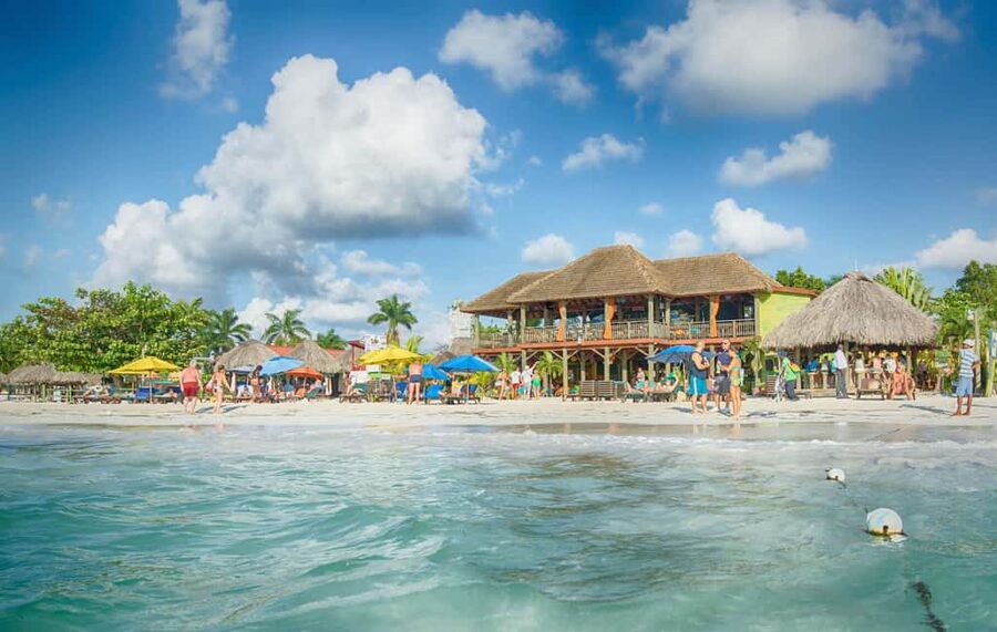 From Montego Bay: Negril Beach & Rick's Cafe Sunset Day Trip - Margaritaville gives the beach stop structure