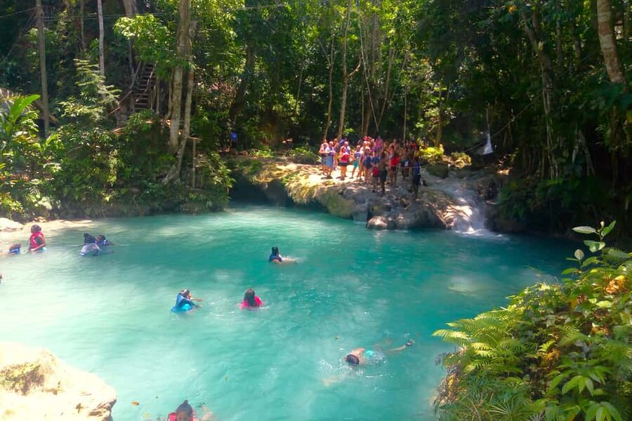 From Runaway Bay: Island Gully Falls and Blue Hole Tour - What the guide adds to the hour