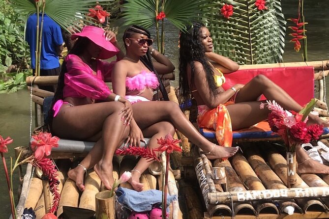 Great River Bamboo Rafting and Limestone Full Body Massage Tour From Montego Bay - Coconut water, sugar cane, and food by the river