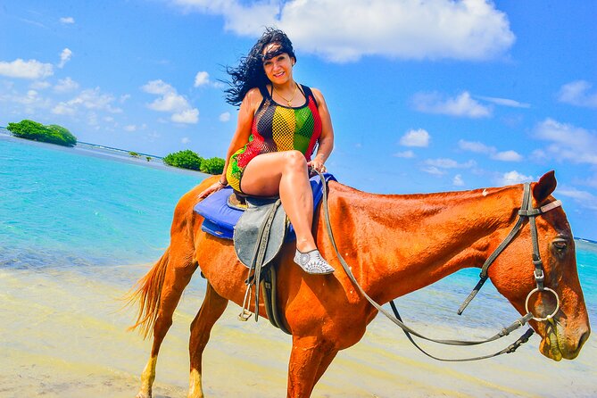 Horseback Ride and Swim Experience Montego with Transportation - Riding from the beach into Montego Bay’s water