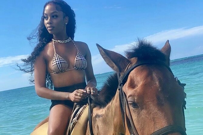Horseback riding + Bamboo river rafting tour from Ocho Rios - Mammee Bay horseback riding through village and sea