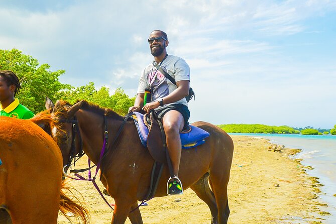 Jamaica's Ocean Horseback Bamboo Raft Adventure and Transport - Riding Into the Ocean Waves