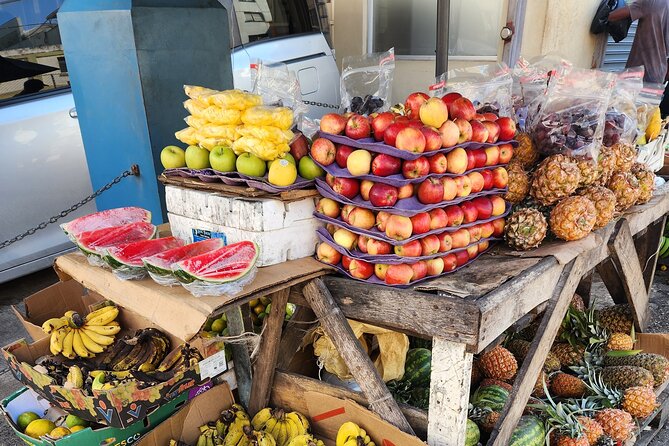 Jamaican Street Food and Rum Tasting Private Tour - The first tastes: patties, jerk chicken, and Jamaican flavor