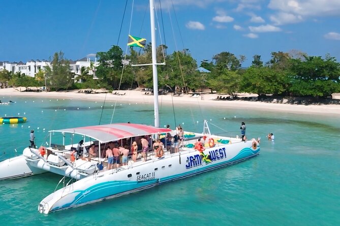 Jamwest Beach Negril Family Catamaran Cruise Pick up from Lucea - The Rick’s Cafe stop and sunset