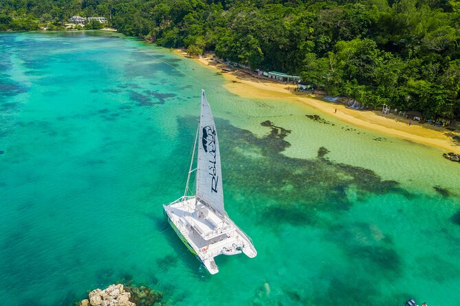Lovers Rock Catamaran Cruise From Ocho Rios - Sailing out from Ocho Rios Bay Beach