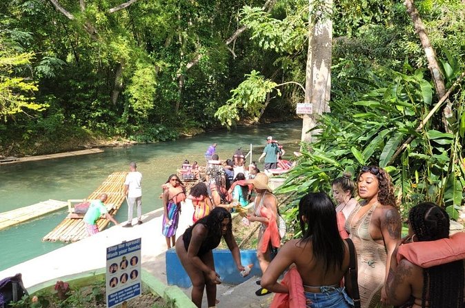 Martha Brae Private River Rafting from Montego Bay - Sitting aboard a traditional bamboo raft