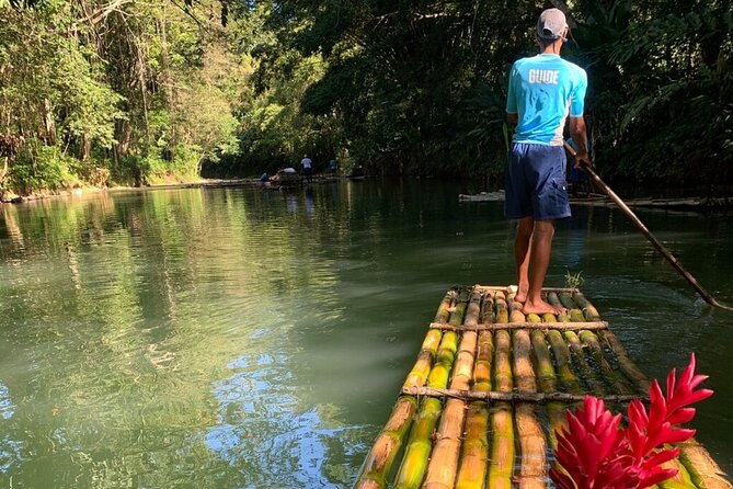 Montego Bay Bamboo Rafting & limestone Massage Private Transfer. - Floating the clear water on a bamboo raft