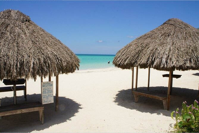 Negril Beach & Rick's Cafe Tour - Rick’s Cafe adds cliffs, drinks, and a famous view