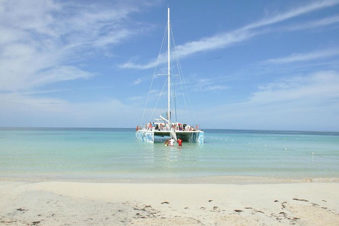 Negril Highlights Catamaran Cruise With Stop At Margaritaville - Riding the catamaran with a live DJ