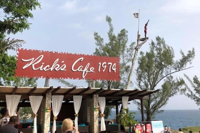 Negril PRIVATE CHARTER Catamaran (rate for 21 persons) - Rick’s Café, cliff jumping, and one busy hour