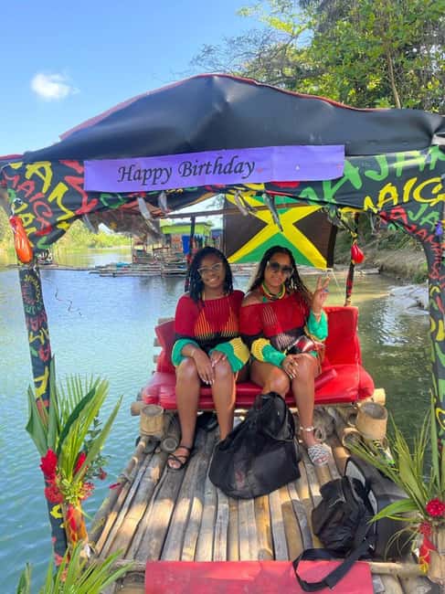 Ocho Rios : Bamboo River Rafting in Ocho Rios Jamaica. - Settling onto the bamboo raft