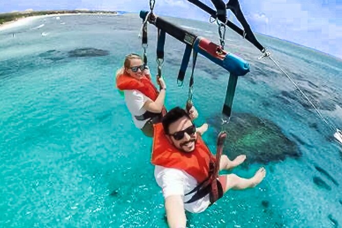 Parasailing above Turquoise Ocean Waters in Montego Bay - Your Ride From the Resort