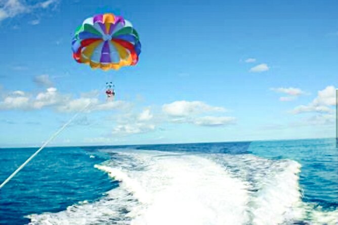 Parasailing above Turquoise Ocean Waters in Montego Bay - Coming Back Down to Beach Time