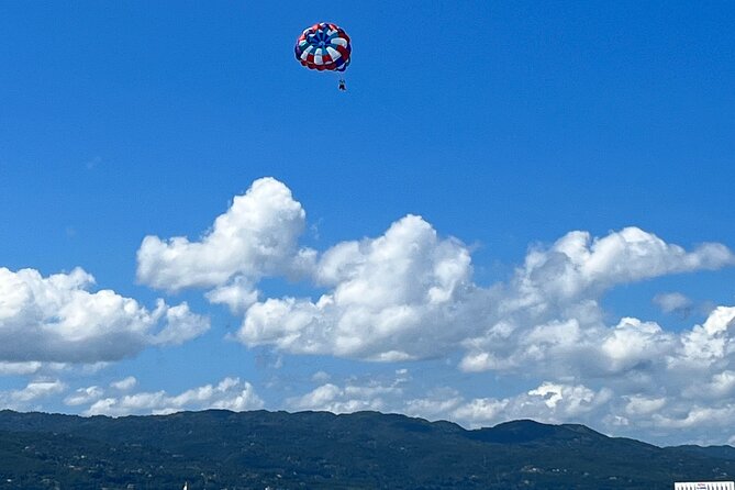 Parasailing above Turquoise Ocean Waters in Montego Bay - Service That Helps the Day Run Smoothly