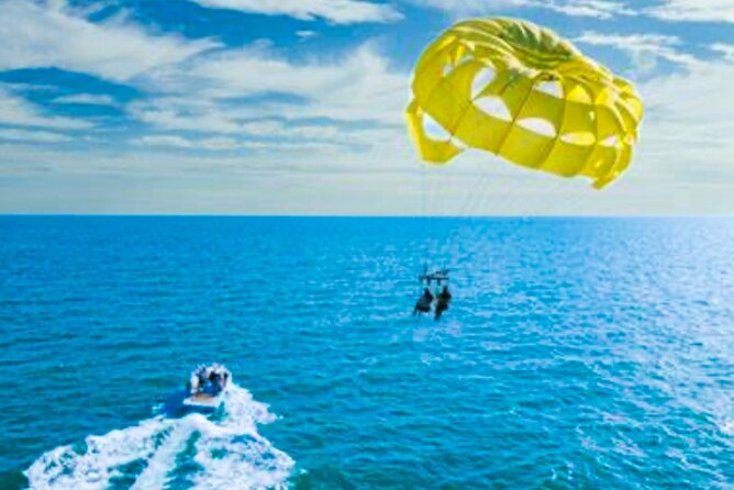 Parasailing above Turquoise Ocean Waters in Montego Bay - Who Will Enjoy This Most