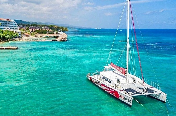 Party Catamaran Cruise with Open Bar and Snorkeling Montego Bay - Open bar, snacks, and the party atmosphere