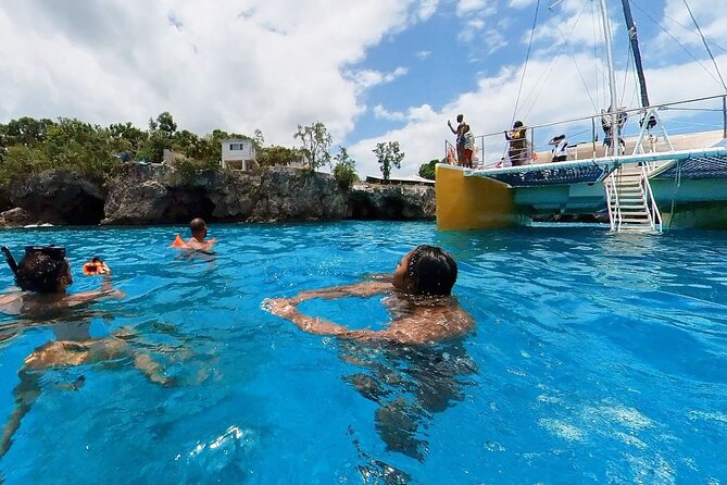 Party Catamaran Sunset Ricks Cafe Negril Open Bar and DJ - A Party Boat With a Sunset Finish