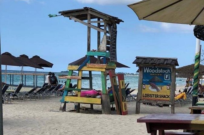 PREMIUM - Negril Highlights Tour from Negril - Food & Drinks Included - Meeting locals over dominoes and jerk chicken