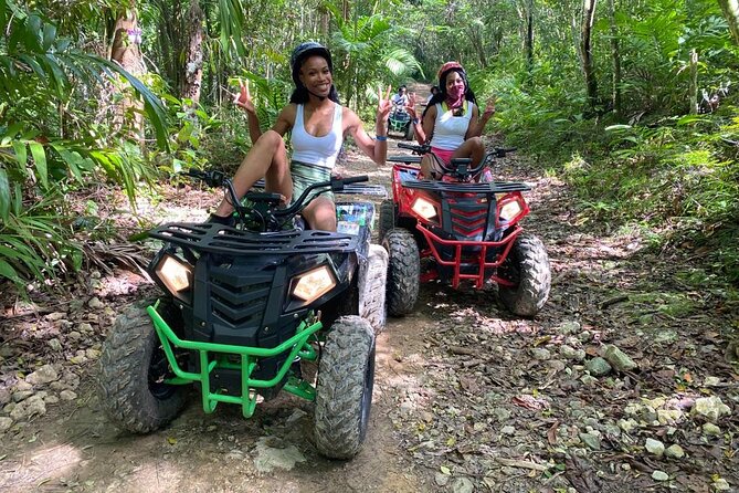 Private ATV Ride 7 Mile Beach & Rick’s Café Negril Tour - Jerk chicken in an open-air setting
