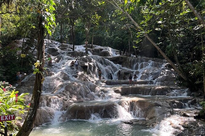 Private fun fill tour from Montego Bay to dunns river & blue hole - Dunn’s River Falls turns a waterfall into a climb