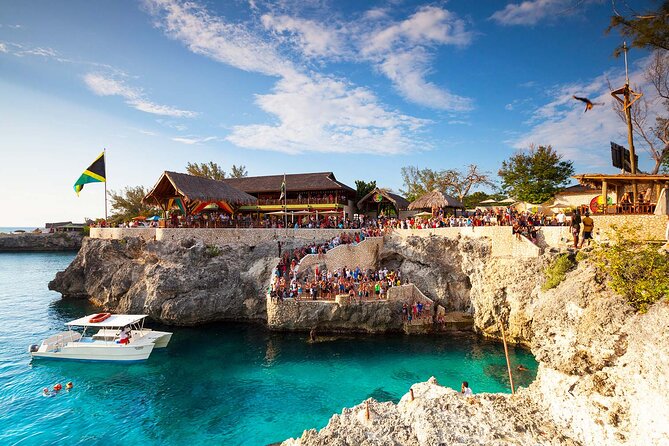 Private Trip to Blue Hole Mineral Springs, Negril & Ricks Café - Negril’s seven-mile beach and Margaritaville