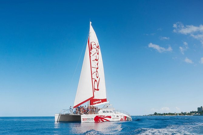 Reggae Family Catamaran Cruise From Montego Bay - Margaritaville nearby, not an isolated reef