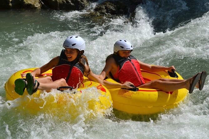 River Rapids Tubing and Beach Visit with Private Transportation - Guides who keep the river section organized