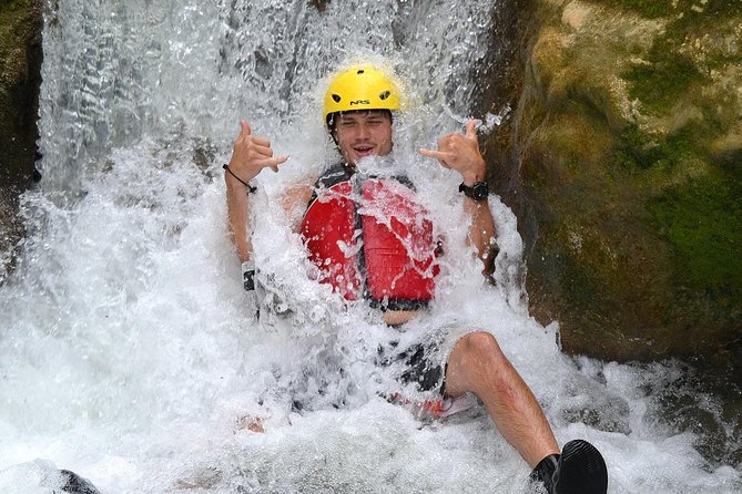 River Rapids Waterfalls Rafting and Beach Adventure - Bamboo shade, waterfall water, and the rope swing