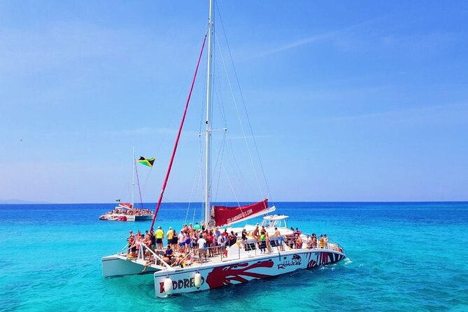 Sunset Catamaran cruise, Snorkeling and Rick's Cafe from Mobay - One hour at Seven Mile Beach