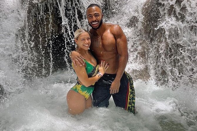 Zipline, Dunn’s River Falls, Bamboo Rafting & Horseback Ride Tour - Climbing Dunn’s River Falls in the first two hours